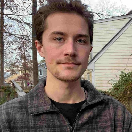 A person drinking from a bottle

Description automatically generated